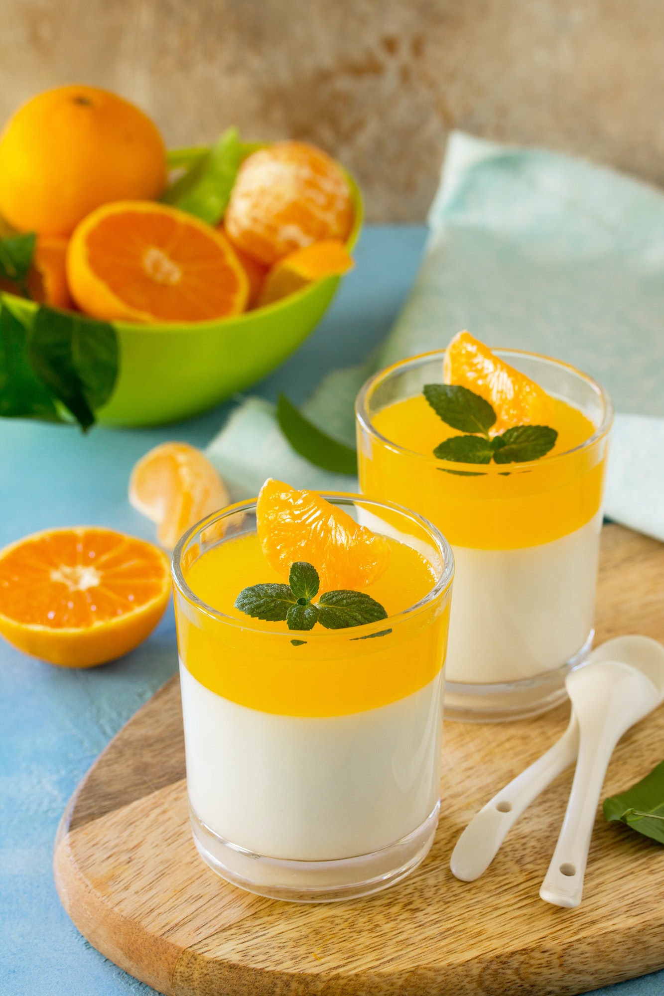 Panna cotta with tangerines jelly and mint, Italian dessert, homemade cuisine.